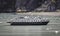 Tourists Exploring Glacier Bay Alaska on a Small Adventure Cruise Ship