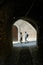 Tourists exploring the old town in the narrow streets of Malcesine on Lake Garda in Italy