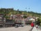 Tourists with families walk on the bridge in the center of old Tbilisi to see the sights. Georgia, Tbilisi - June 2019