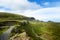 Tourists favourite place in Scotland - Isle of Skye. Very famous castle in Scotland called Eilean Donan castle. Scotland green nat