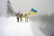 Tourists with the flag of Ukraine