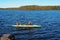 Tourists float on a canoe