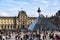 Tourists flocking around the Louvre