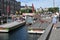 Tourists and food and drinks and boat ride life at Nyhavn Canal