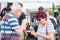 Tourists food before the start of the nestinar games in the village of Bulgari, Bulgaria