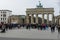 Tourists in front of the Brandenburg Gate.