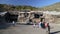 Tourists in front of entrances to Aurangabad caves.