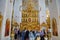Tourists in front of the iconostasis of the Epiphany Cathedral, Kolomna, Russia