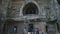 Tourists in front of one of entrances to Aurangabad caves.