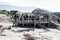 Tourists gather on the viewing deck at boulders beach