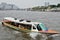 The tourists get on boat for sightseeing along Chao Phraya River