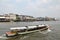 The Tourists Get On Boat For Sightseeing Along Chao Phraya River