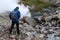 Tourists going explore to the valley of geysers, soaring water from geysers, extreme