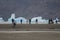 Tourists in Grey Lake and icebergs in the background.