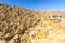 Tourists group Moon Valley geological formations, La Paz cliffs