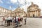 Tourists group with tour guide in Rome, Italy. Piazza del Popolo. Traveling