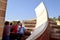 Tourists and guide at local time astronomical instrument, Jaipur observatory, Rajasthan, India