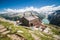 Tourists have rest at Olpererhutte mountain hut in Zillertal in Austrian Alps with beautiful scenery view