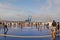 Tourists in Helipad for helicopter on the upper deck of big cruise ship