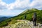 Tourists hiking in the Carpathian mountains.