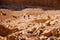 Tourists hiking in dead sea mountains