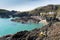 Tourists and holidaymakers enjoying late summer sunshine at Kynance Cove beach The Lizard Cornwall England UK