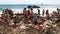 Tourists at hot water beach, hahei