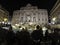 Tourists at Illuminated Fontana Di Trevi, Trevi Fountain at night, Rome, Italy April, 2019