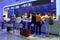 Tourists in the interior of Bangkok airport at the tax refund counter