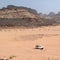 Tourists jeep driving in the desert