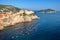 Tourists, kayaking, view at The Old town of Dubrovnik and Lokrum island from Fort Lovrijenac, Croatia