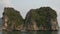 Tourists in kayaks exploring the caves of the limestone islands of Ha Long Bay, Cat Ba National Park,