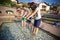 Tourists in Kneipp pool in Castelrotto, Italy