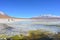 Tourists at a lake in Eduardo Alvaroa National Park, Bolivia