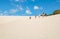 Tourists on Lake Wabby sand blow, Fraser Island, Queensland, Australia