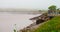 Tourists and local people observe the tidal bore roll into Moncton, New Brunswick, Canada.