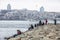 Tourists and local People relaxing near Bosphorus strait