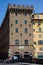 Tourists and locals crossing the historical Saint Trinity Bridge in Florence