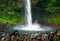 Tourists and locals visiting the La Fortuna waterfall in Costa Rica