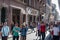 Tourists and locals walking the famous Via dei Condotti street