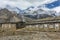 Tourists lodge on the Annapurna circuit trek with snowy mountain