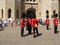 Tourists look the ceremony of changing of the Queen`s Guard in the Tower of London, UK.
