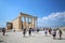 Tourists look at Erechtheion in Athens Acropolis, Greece