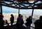 Tourists looking at Dubai cityscape from a high vantage point, U