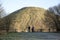 Tourists looking at Silbury Hill near Avebury UK