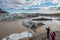 Tourists looking at Svinafellsjokull glacier in Iceland