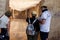 Tourists looking the two-apse room of the Villa Romana del Casale, Piazza Armerina