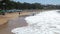 Tourists lounge on the beautiful beach of Wailea