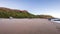 Tourists from a luxury expedition cruise ship board helicopters on a remote beach on Naturalist Island in the Kimberley for a