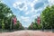 Tourists on The Mall walking southwest towards Buckingham Palace in London